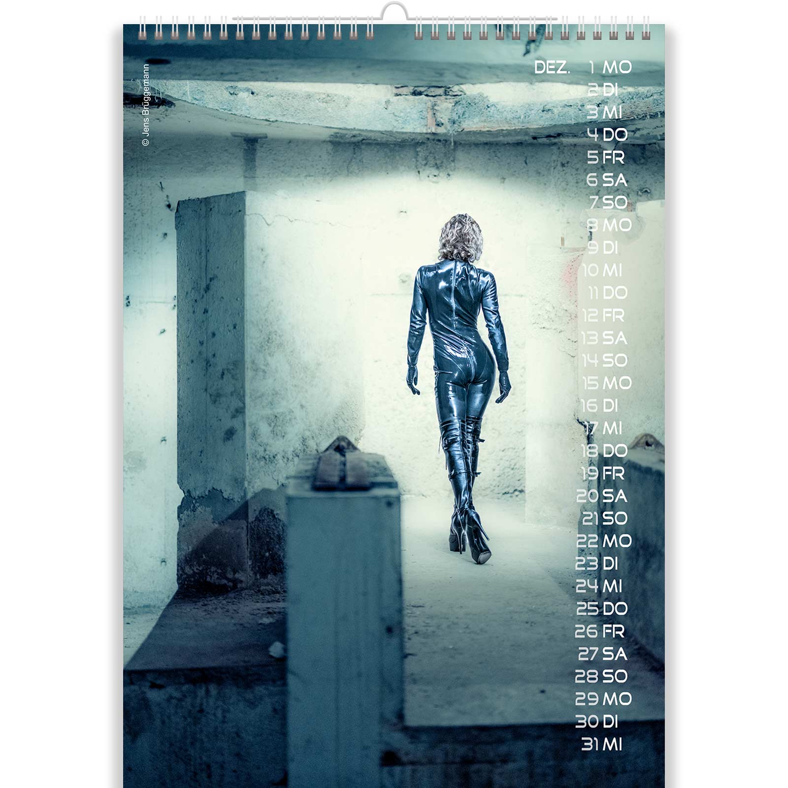 Slave in Black Latex in Fetish Calendar